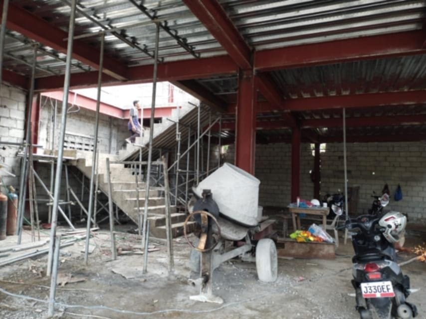 Two-storey structural steel frame mid-construction, AEDO site